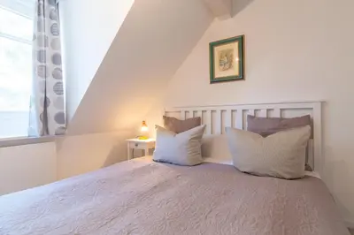 Ein Bett oder Betten in einem Zimmer der Unterkunft Darsser Freiraum