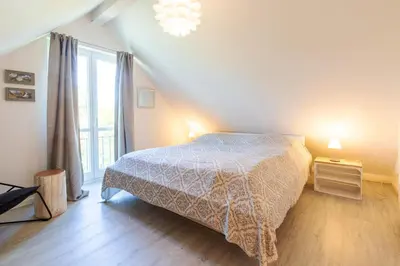 Ein Bett oder Betten in einem Zimmer der Unterkunft Darsser Freiraum