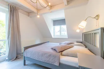 Ein Bett oder Betten in einem Zimmer der Unterkunft Darsser Freiraum