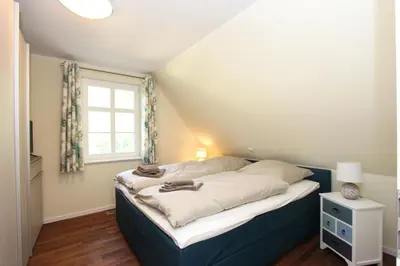 Ein Bett oder Betten in einem Zimmer der Unterkunft Steven