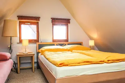 Ein Bett oder Betten in einem Zimmer der Unterkunft Likedeeler