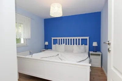 Ein Bett oder Betten in einem Zimmer der Unterkunft Madleen
