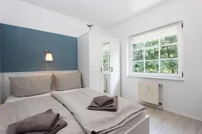 Ein Bett oder Betten in einem Zimmer der Unterkunft Windjammer