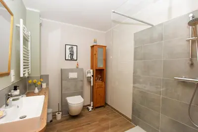 Ein Badezimmer in der Unterkunft Windjammer