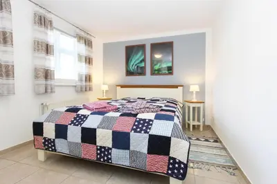 Ein Bett oder Betten in einem Zimmer der Unterkunft Altes Kapitänshaus