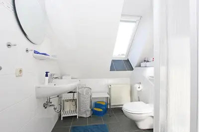 Ein Badezimmer in der Unterkunft Altes Kapitänshaus