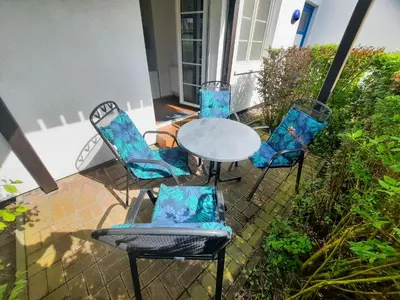 Ein Garten an der Unterkunft Kormoran Dünensommer