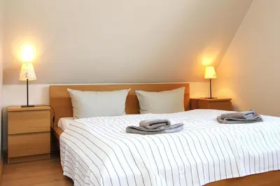 Ein Bett oder Betten in einem Zimmer der Unterkunft Achtern-Stems 1