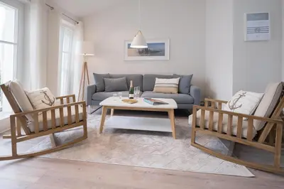 Ein Sitzbereich in der Unterkunft Ferienwohnung Düne 18