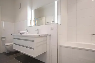 Ein Badezimmer in der Unterkunft Ferienwohnung Düne 18