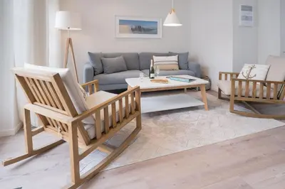 Ein Sitzbereich in der Unterkunft Ferienwohnung Düne 18