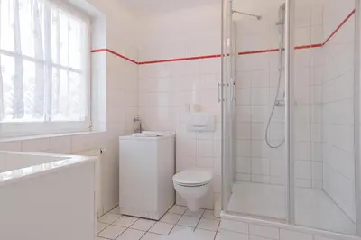 Ein Badezimmer in der Unterkunft Born - Wieck Ferienwohnung Romantik