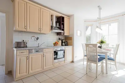 Küche/Küchenzeile in der Unterkunft Born - Wieck Ferienwohnung Romantik