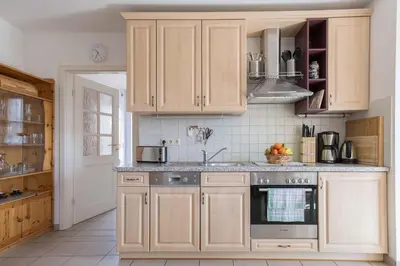 Küche/Küchenzeile in der Unterkunft Born - Wieck Ferienwohnung Romantik