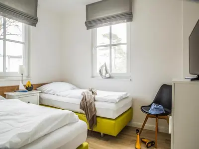 Ein Bett oder Betten in einem Zimmer der Unterkunft Ferienwohnung, Zingst