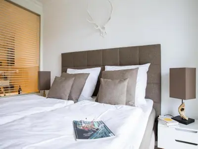 Ein Bett oder Betten in einem Zimmer der Unterkunft Ferienwohnung, Zingst