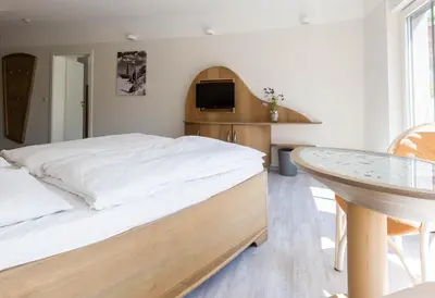 Ein Bett oder Betten in einem Zimmer der Unterkunft Muschel 2
