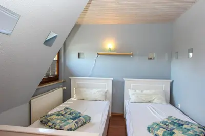 Ein Bett oder Betten in einem Zimmer der Unterkunft 2 Ton Timmermanns Hus