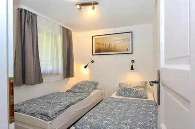 Ein Bett oder Betten in einem Zimmer der Unterkunft 3 Ton Timmermanns Hus