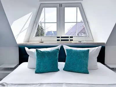 Ein Bett oder Betten in einem Zimmer der Unterkunft Seensucht