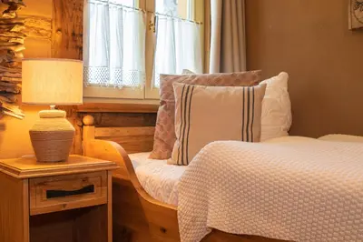 Ein Bett oder Betten in einem Zimmer der Unterkunft Cozy Five