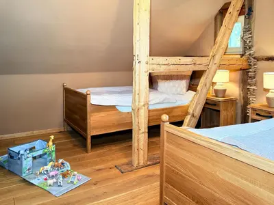 Ein Bett oder Betten in einem Zimmer der Unterkunft Cozy Five