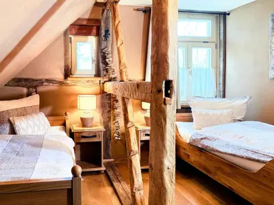 Ein Bett oder Betten in einem Zimmer der Unterkunft Cozy Five
