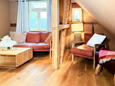 Ein Sitzbereich in der Unterkunft Cozy Five