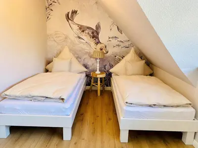 Ein Bett oder Betten in einem Zimmer der Unterkunft Strandhaus Luma