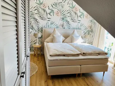 Ein Bett oder Betten in einem Zimmer der Unterkunft Strandhaus Luma