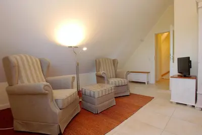 Ein Sitzbereich in der Unterkunft Neue Reihe 28 - Wohnung Ankerplatz
