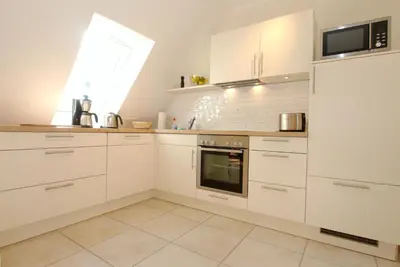 Küche/Küchenzeile in der Unterkunft Neue Reihe 28 - Wohnung Ankerplatz