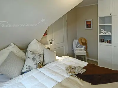 Ein Bett oder Betten in einem Zimmer der Unterkunft Kavelweg 13 Whg 4 - Kleiner Käptn