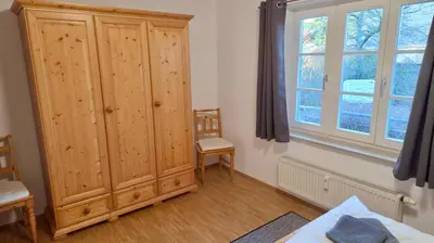 Ein Bett oder Betten in einem Zimmer der Unterkunft Haus Wieck auf dem Darß