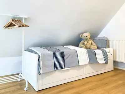 Ein Bett oder Betten in einem Zimmer der Unterkunft Haus am kleinen Hafen No. 2