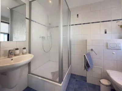 Ein Badezimmer in der Unterkunft Haus am kleinen Hafen No. 2
