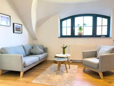 Ein Sitzbereich in der Unterkunft Haus am kleinen Hafen No. 3