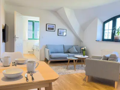 Ein Sitzbereich in der Unterkunft Haus am kleinen Hafen No. 3