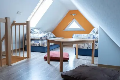 Ein Bett oder Betten in einem Zimmer der Unterkunft Haus Sabine - OG