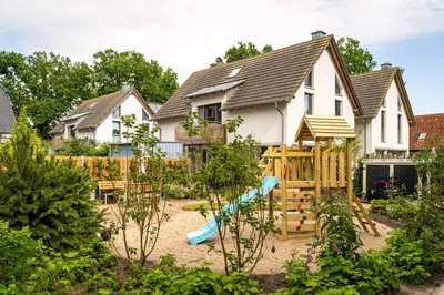 Ein Garten an der Unterkunft Haus Strandflieder - Kamin, Sauna & Terrasse