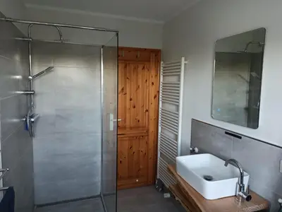 Ein Badezimmer in der Unterkunft Ferienwohnung Born am Darßwald OG