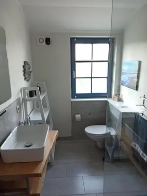 Ein Badezimmer in der Unterkunft Ferienwohnung Born am Darßwald OG