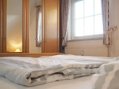 Ein Bett oder Betten in einem Zimmer der Unterkunft Stems W4