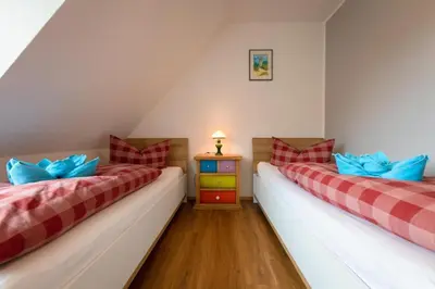 Ein Bett oder Betten in einem Zimmer der Unterkunft Doppelhaus 7 - Wiesengrund