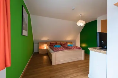 Ein Bett oder Betten in einem Zimmer der Unterkunft Doppelhaus 7 - Wiesengrund