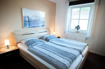 Ein Bett oder Betten in einem Zimmer der Unterkunft Fritz-Reuter-Straße 4 Whg 2 - a57823