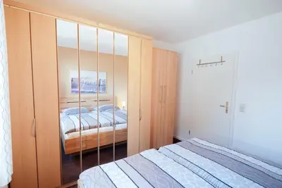 Ein Bett oder Betten in einem Zimmer der Unterkunft Fritz-Reuter-Straße 4 Whg 2 - a57823