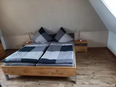 Ein Bett oder Betten in einem Zimmer der Unterkunft Alte Reihe 10 Whg 5 - a57737