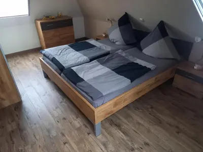 Ein Bett oder Betten in einem Zimmer der Unterkunft Alte Reihe 10 Whg 5 - a57737