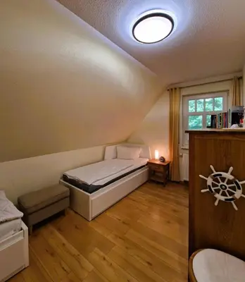 Ein Bett oder Betten in einem Zimmer der Unterkunft Haus 